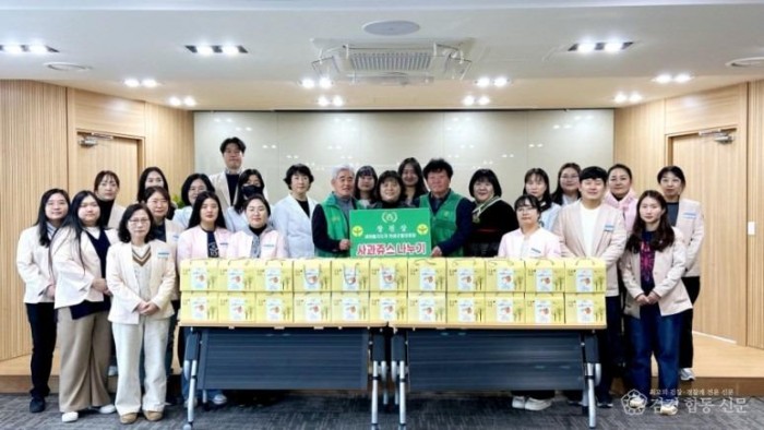 03의성군제공 사랑의 사과주스 나눔.jpg