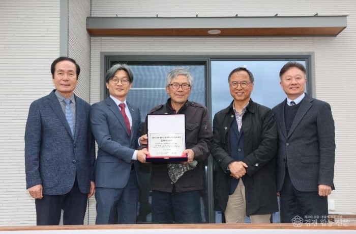 02의성군제공 단촌면 주택 복구 공사 현판식1.jpg